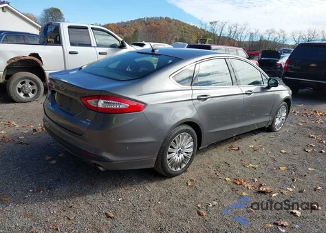 2013 Ford Fusion Hybrid Se z USA, uszkodzony, nr VIN 3FA6P0LU6DR379831